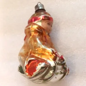 Vintage Glass Christmas Ornament Toy Kid on Sledge